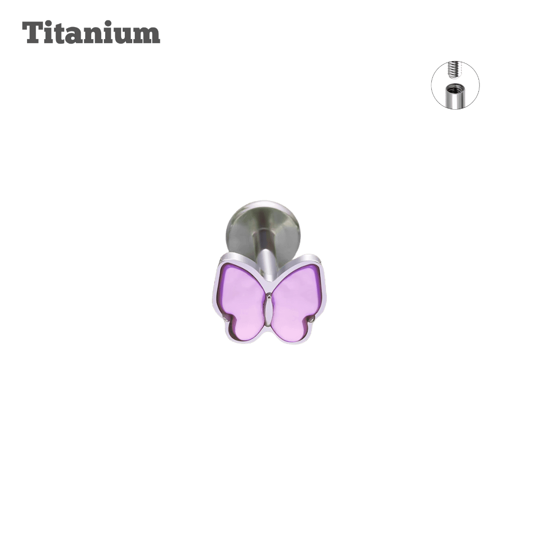 Purple Butterfly-shaped earring with titanium marking on a black background